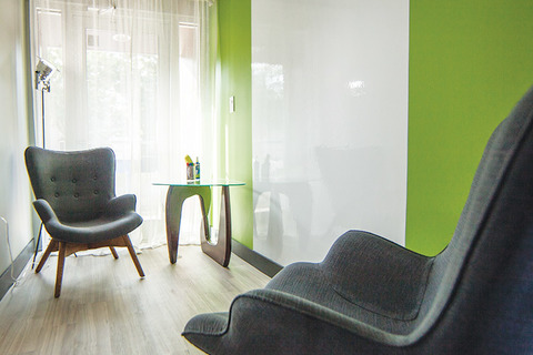 a green chair in a room
