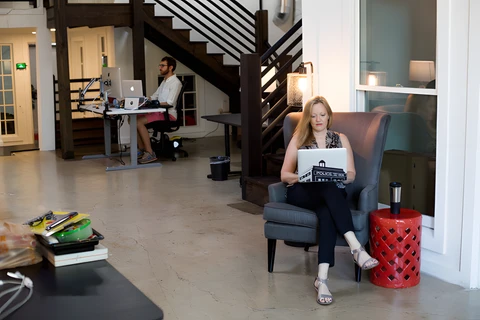 a person sitting in a living room