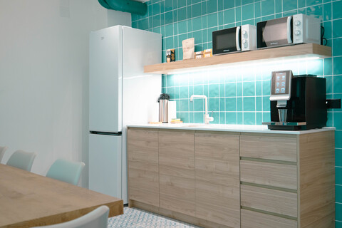 a kitchen with a table and a counter top