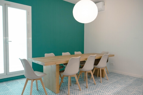 a table and chairs in a room