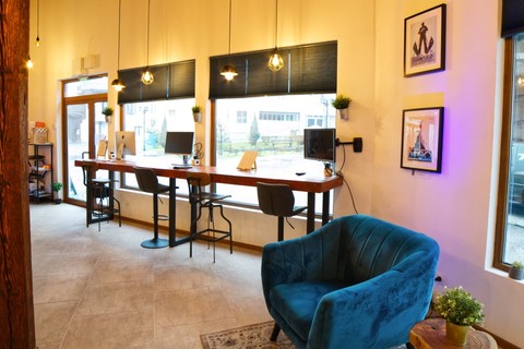 a room filled with furniture and a table