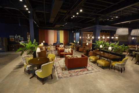 a room with furniture and tables