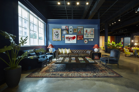a room with a couch and a coffee table