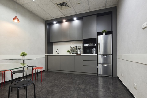 a kitchen with a table in a room