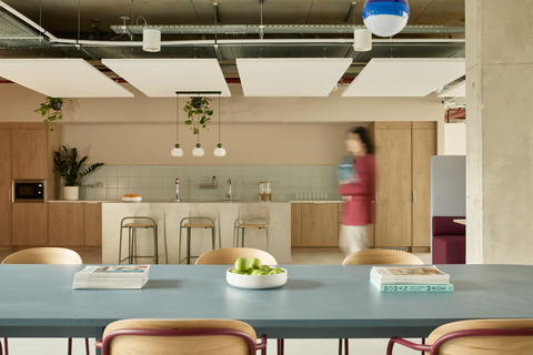 a room with a table and chairs