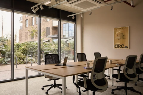 a room with a table and chairs