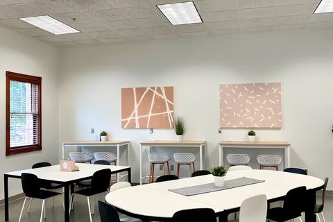 a room filled with furniture and a table