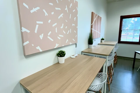 a room with a wooden table