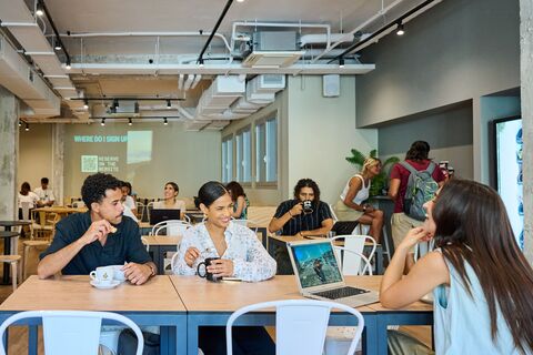 a group of people sitting at a table