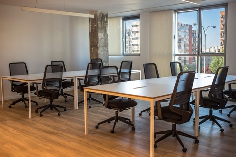 a room with a table and chairs