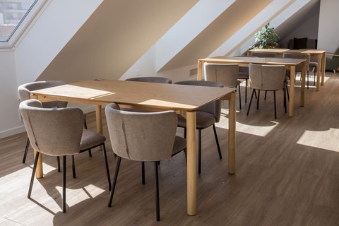 a table and chairs in a room