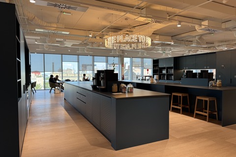 a large room with a large counter and a large window