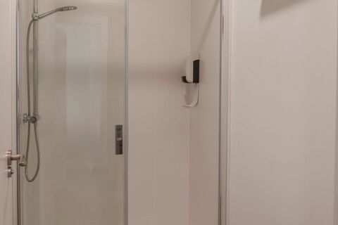 a close up of a shower in a room