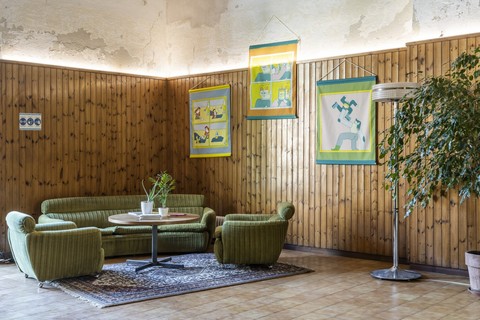 a bedroom with a wooden bench
