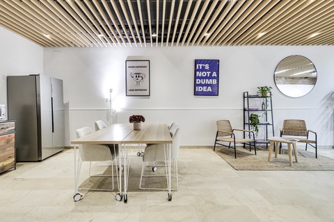 a room filled with furniture and a table