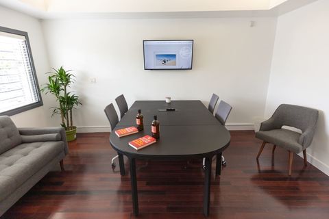 a living room with a wooden floor