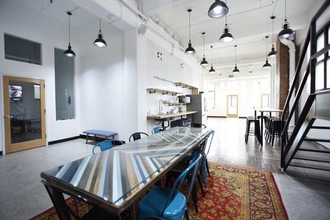 Enjoy working from bright lights and high ceilings common work area