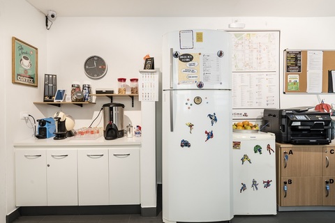 a white refrigerator freezer sitting inside of a kitchen