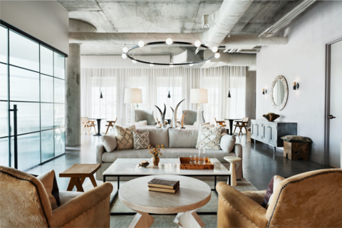 a living room filled with furniture and a fire place