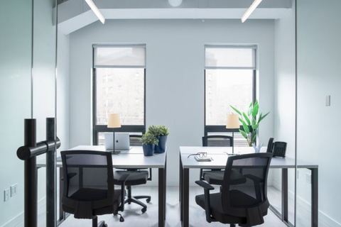 a room filled with furniture and a window