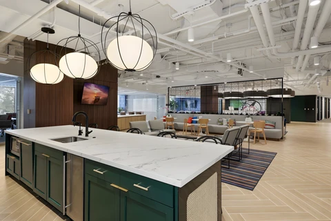 a kitchen with a table and chairs