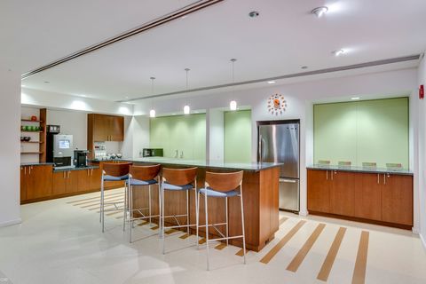 a room filled with furniture and a flat screen tv