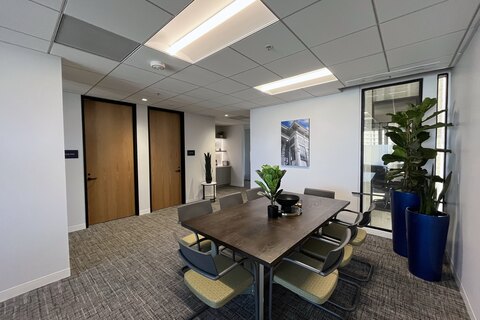 a room filled with furniture and a table