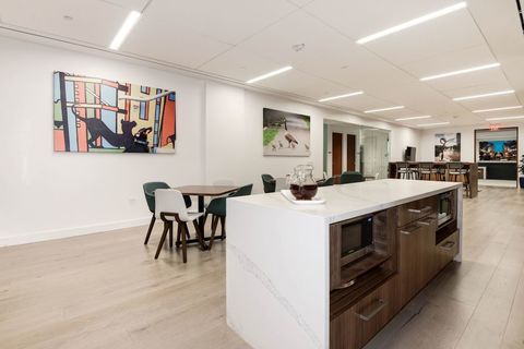 a kitchen with a table in a room