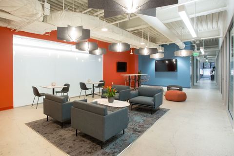 a large red chair in a room