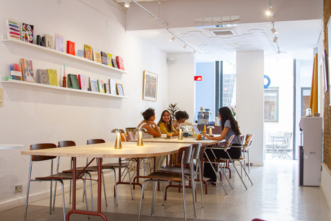 a group of people sitting at a table