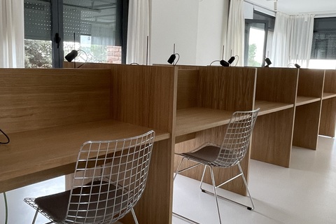 a chair sitting in front of a window