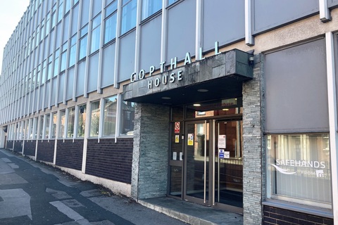 a sign on the side of a building