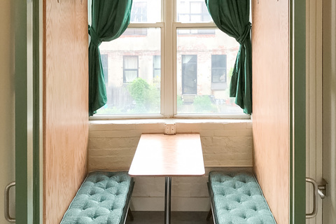 a chair sitting in front of a window