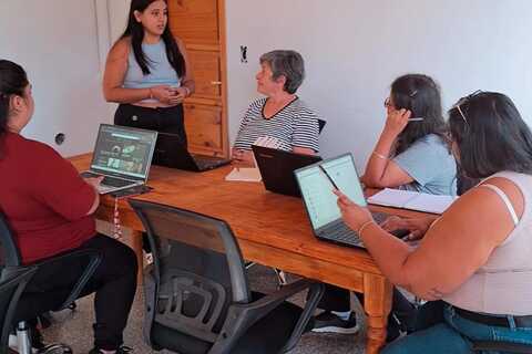 a group of people sitting in a room