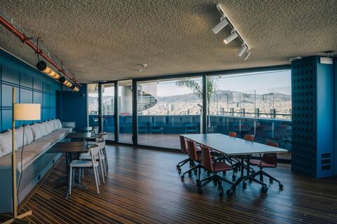 a room with a table and chairs