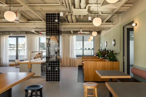 a room with tables and chairs