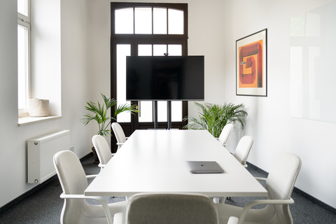 a room with a table and chairs