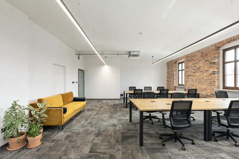 a room with a table and chairs