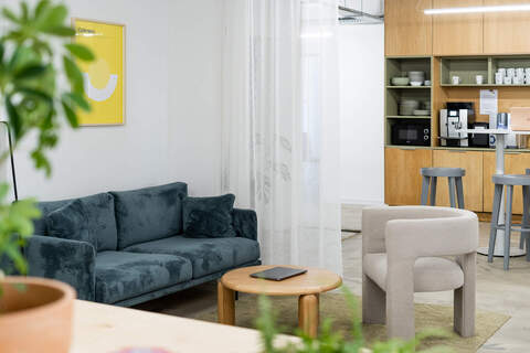 a living room with a couch and a table