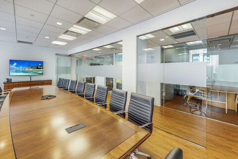 a room filled with furniture and a large window