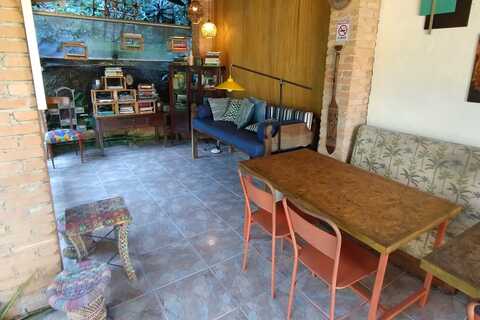 a room filled with furniture and a fireplace
