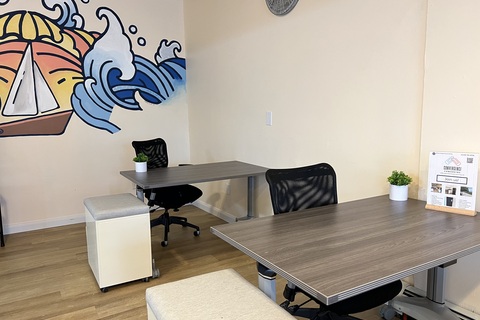 a room filled with furniture and a table