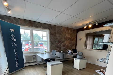 a room filled with furniture and a tv
