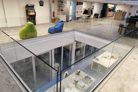 a glass enclosure in a building
