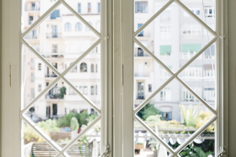 a window with a view of a city