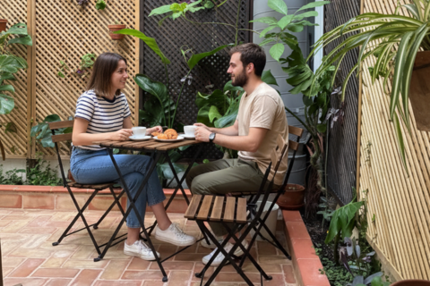 a man and woman sitting at a table
