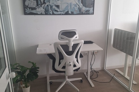 a desk and chair in a room