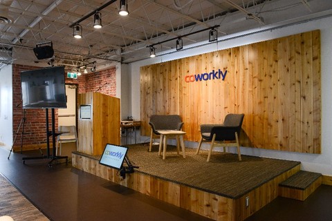 a room filled with furniture on top of a wooden table