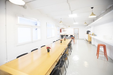 a kitchen with a table in a room
