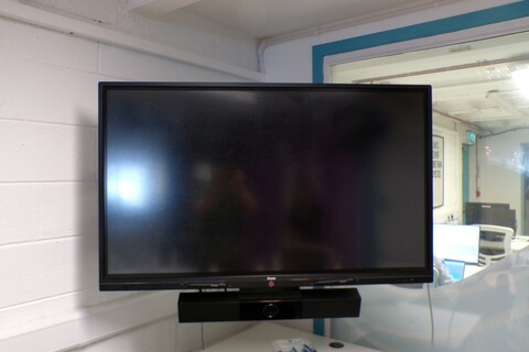 a tv on a shelf